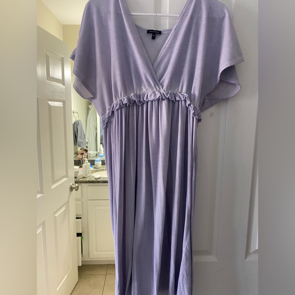 I am selling a purple dress. It has a deep v neck